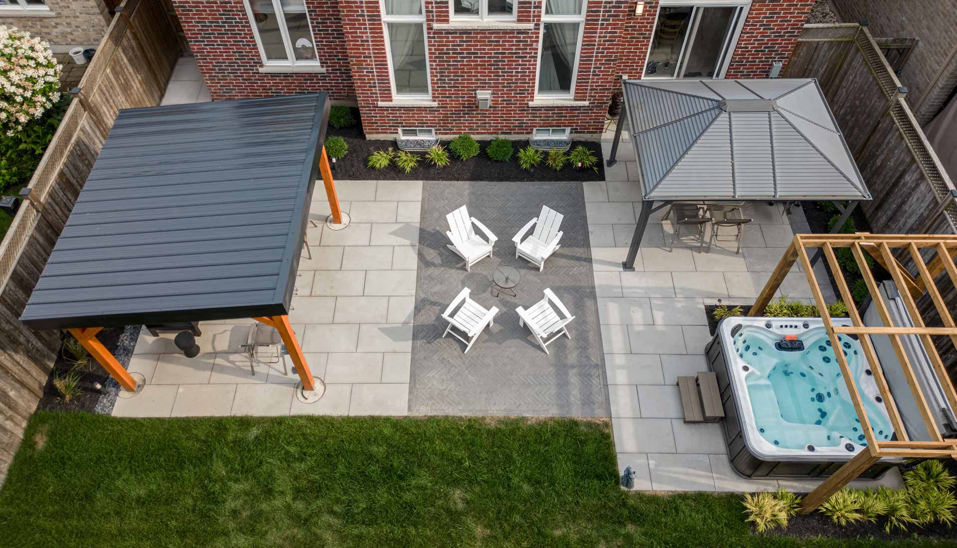 Backyard Patio with Pergolas, Cabanas, Stone Steps, Privacy Fences & more in Oshawa, Ontario.