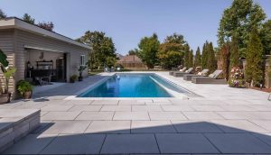 Inground Pool with Cabana & interlock patio landscaping installation in Whitby, Ontario