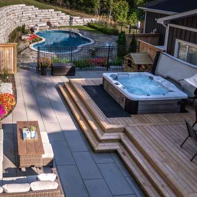 Interlock patio, pool, waterfall feature, retaining wall landscaping companies in Gores Landing & Rice Lake, Ontario